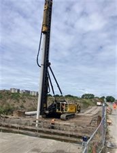Heien palen voor brug over de zandsloot